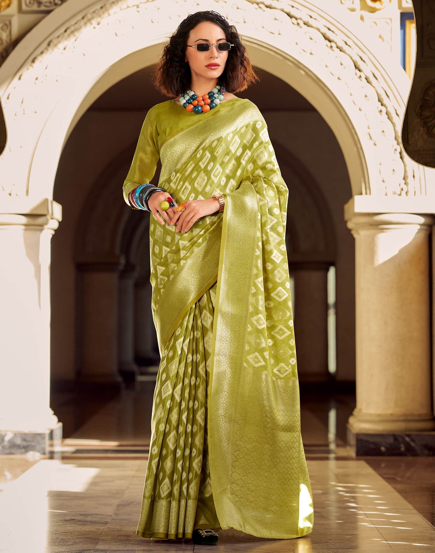 Goldmine Olive Green Tissue Silk Weaving Saree