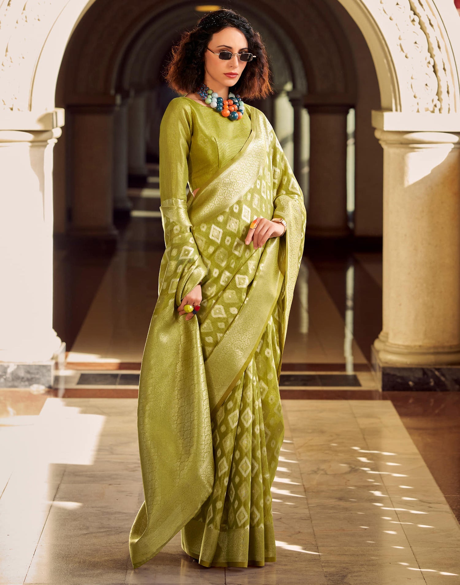Goldmine Olive Green Tissue Silk Weaving Saree