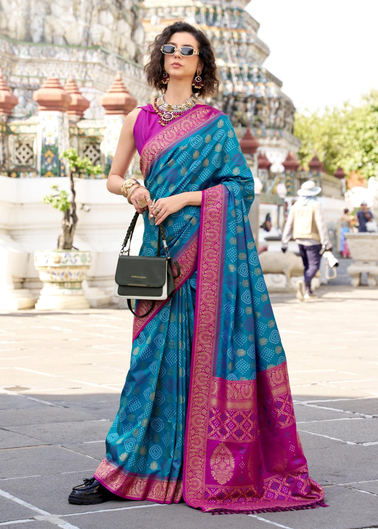 Arohi Teal Soft Banarasi Silk Bandhani Weaving Saree