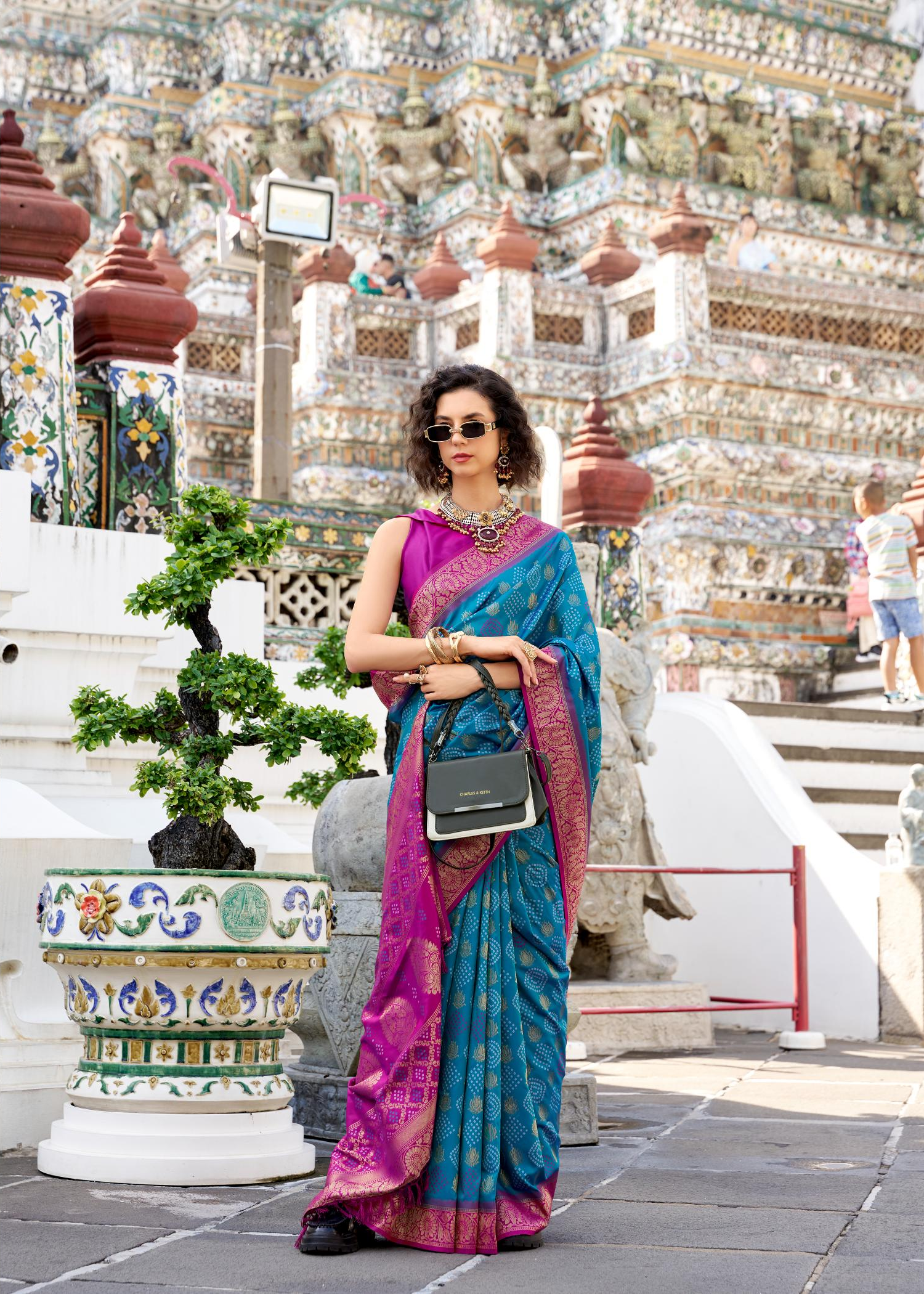 Arohi Teal Soft Banarasi Silk Bandhani Weaving Saree