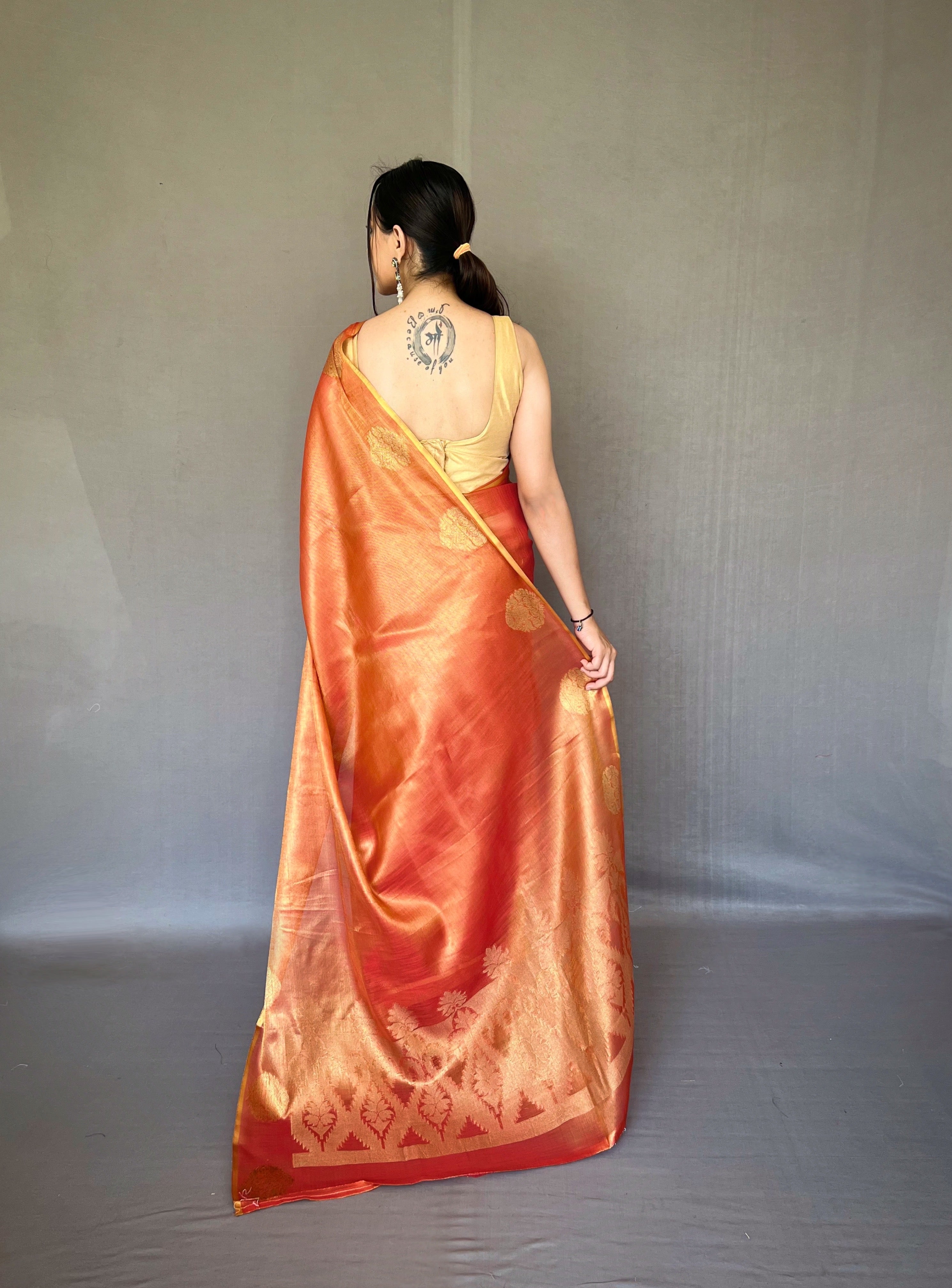 Peach Zari Threaded Tissue Silk Saree