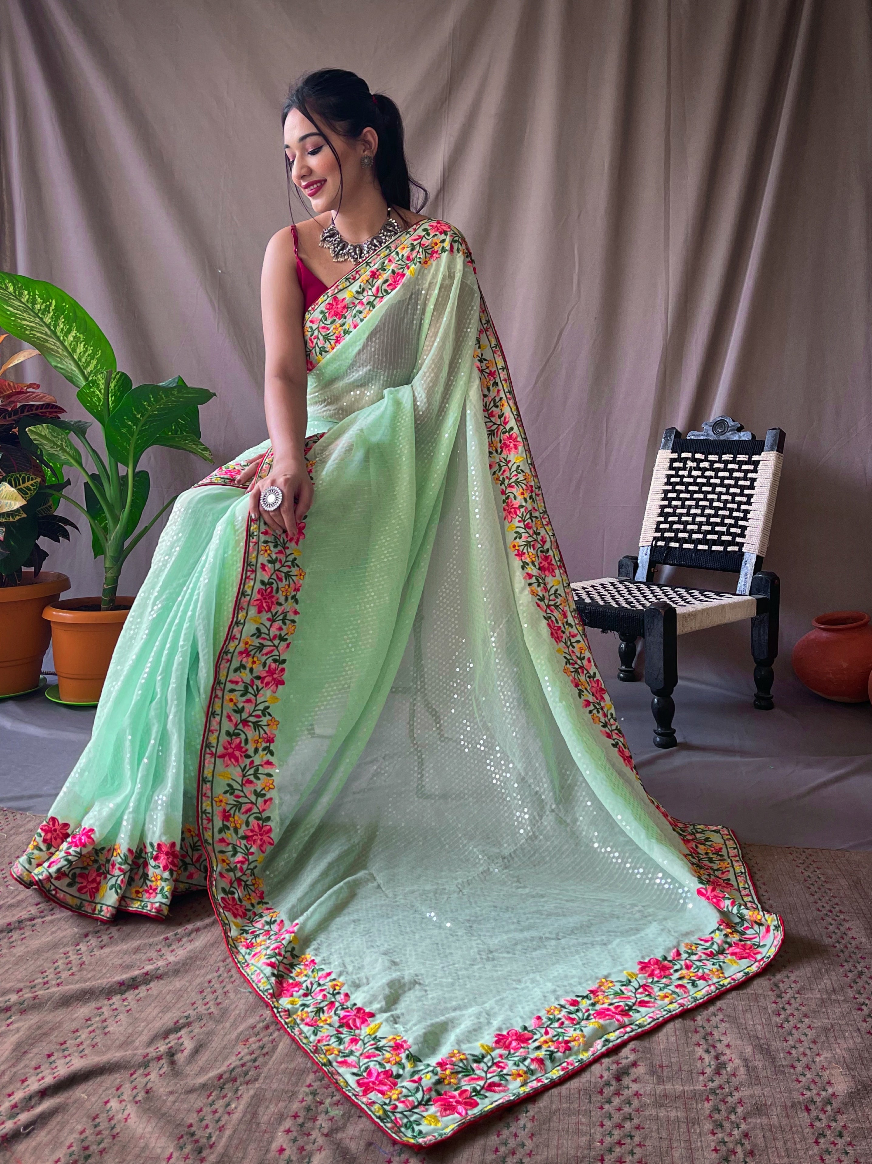 Mint green Sequence Embroidered Work Georgette Saree