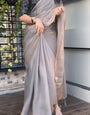 Gilded Grey Fancy Silk Saree With Blouse Piece