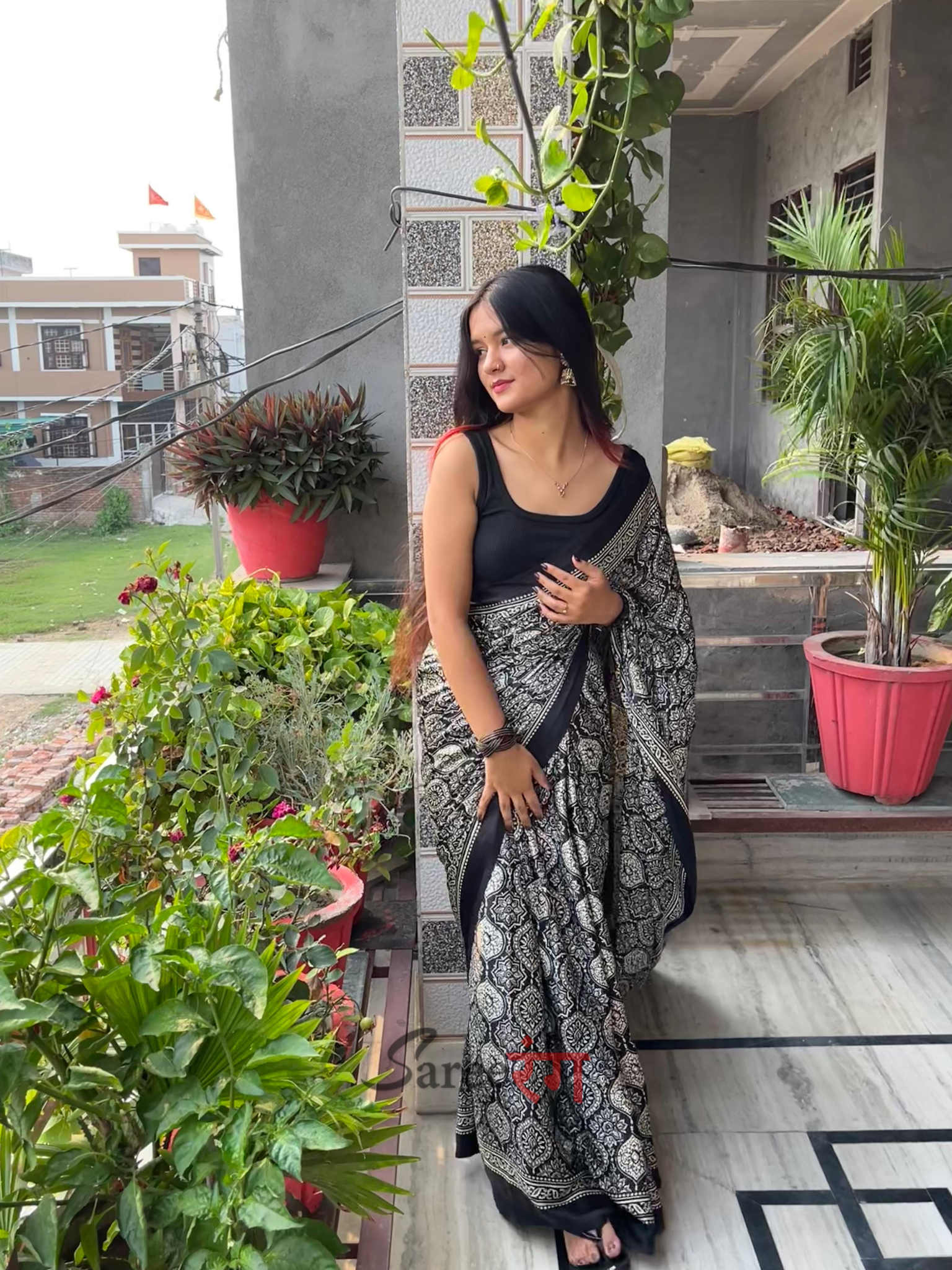 Varnika Black Modal Silk Ajrakh Natural Print saree
