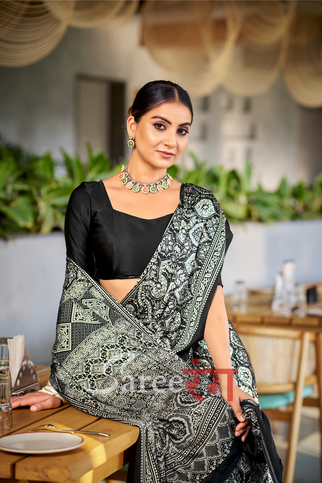 Varnika Black Modal Silk Ajrakh Natural Print saree.