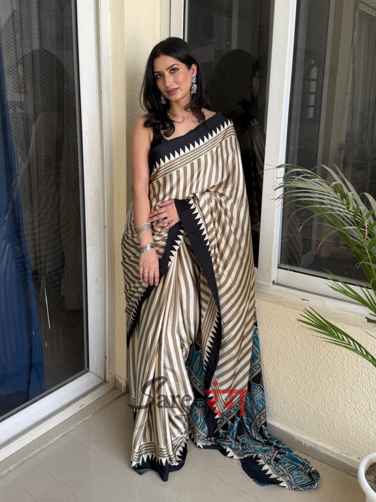 Pallavi Black And Cream Modal Silk Striped Ajrakh Natural Print Saree