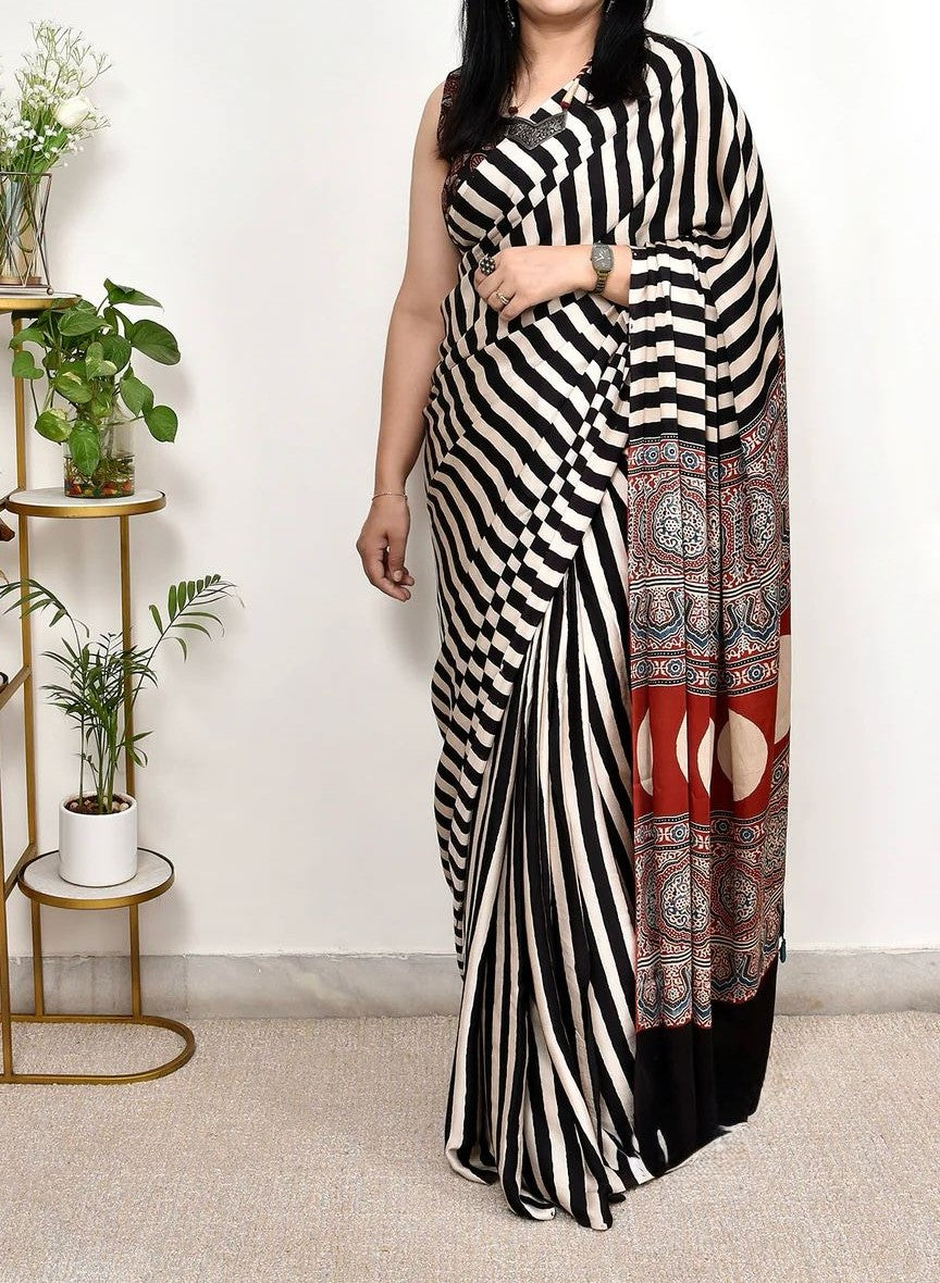 Sundari Black Modal Silk Premium Striped Ajrakh Natural Print Saree.