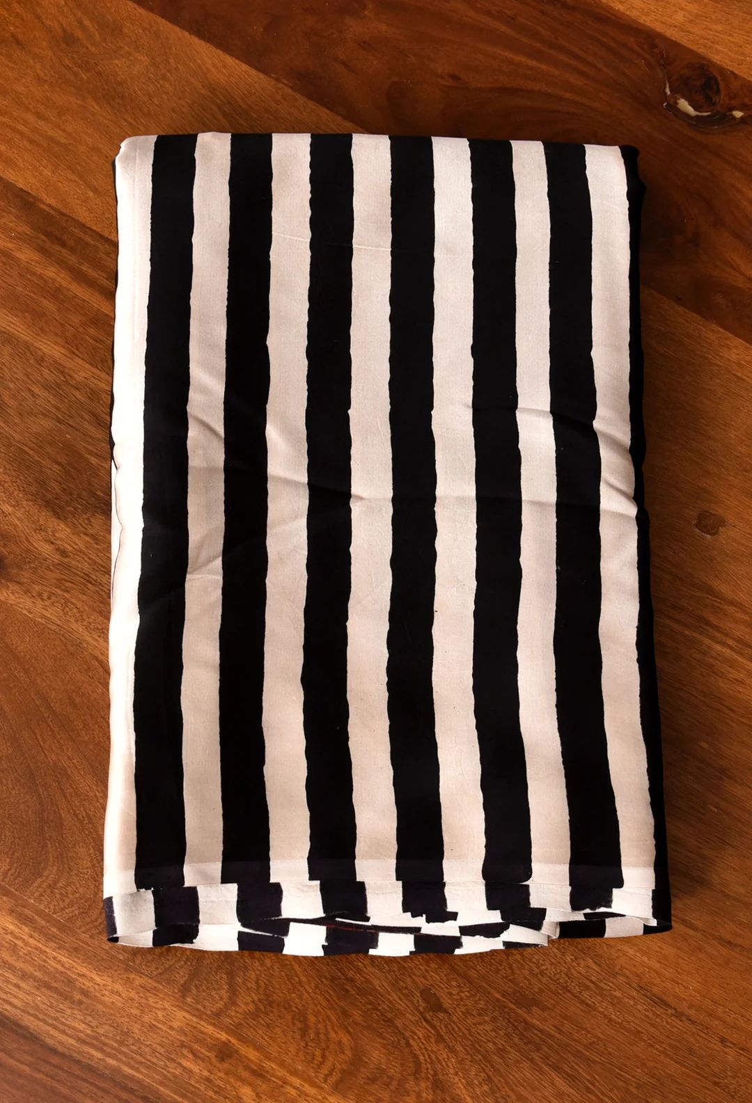 Sundari Black Modal Silk Premium Striped Ajrakh Natural Print Saree.