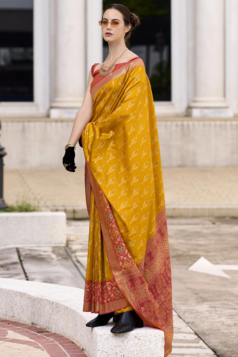 Pyramid Burnt Yellow Banarasi Soft Silk Ikkat Border Saree