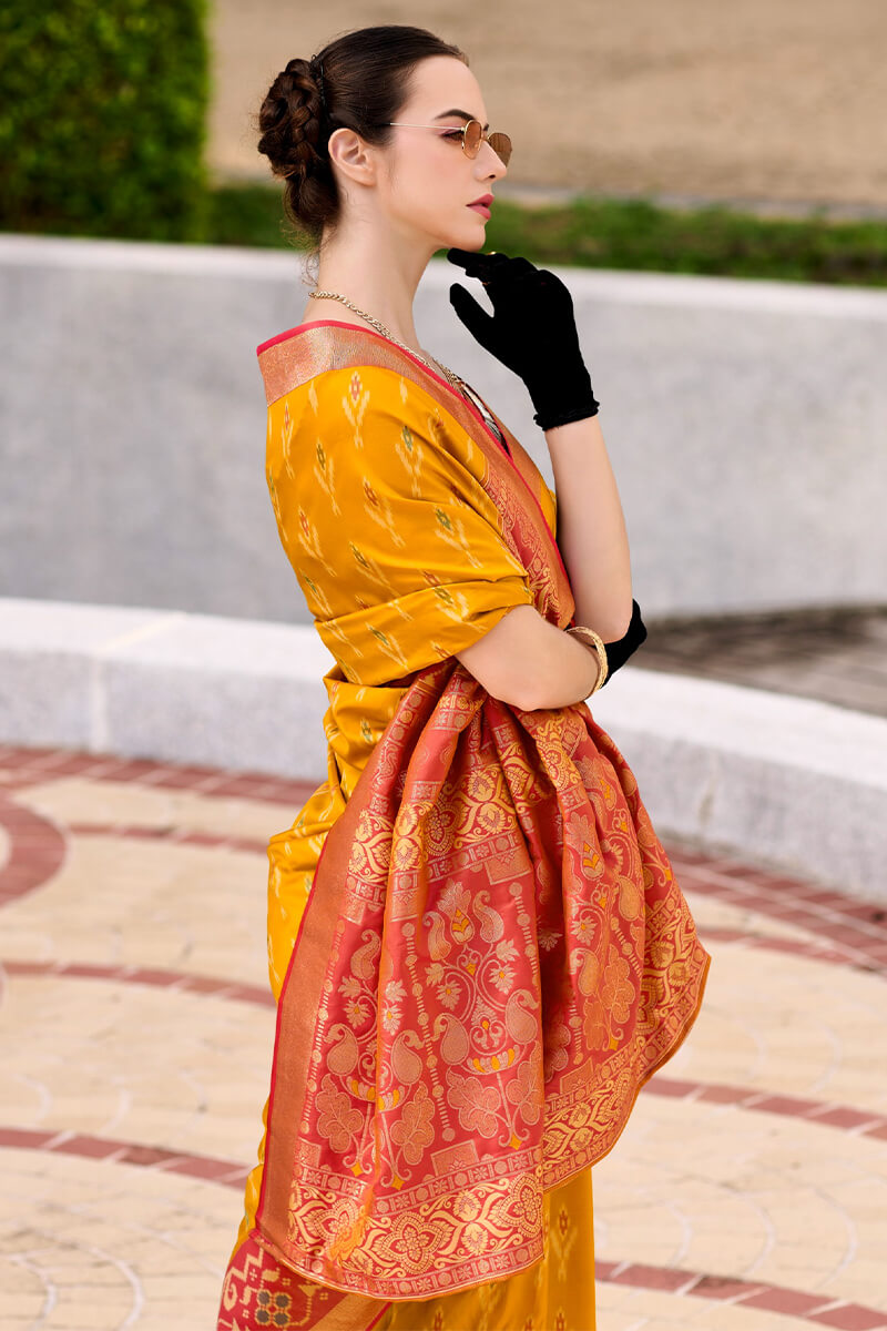 Pyramid Burnt Yellow Banarasi Soft Silk Ikkat Border Saree