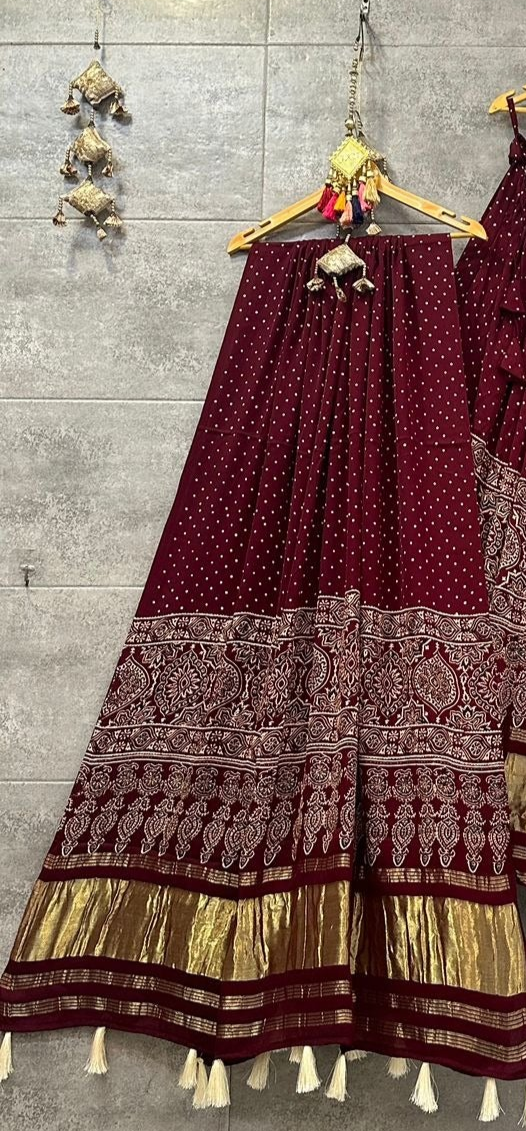 Charming Maroon Ajrakh Hand Block Pure Modal Silk Lehenga Choli With Lagdi Patta