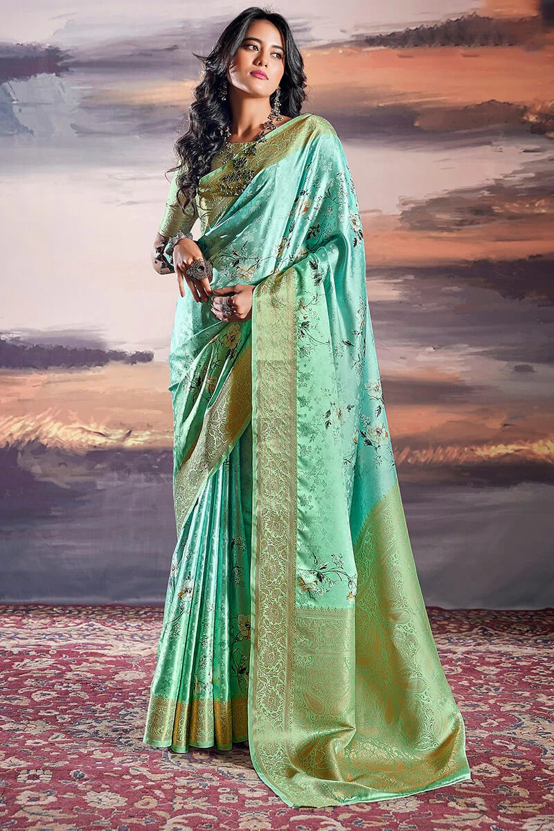 Pratishtha Dewy Green Pure Satin Silk Self Weaving Printed Saree