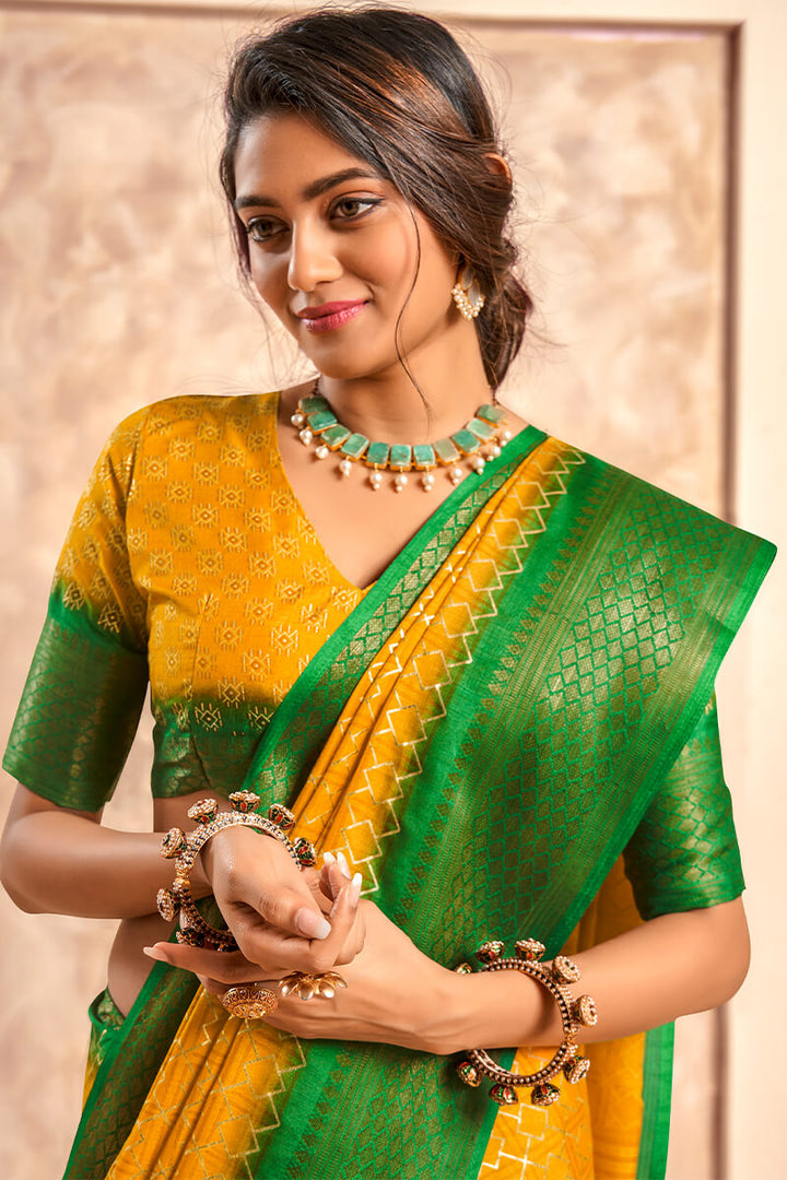 Celo Yellow Soft Dola Silk Foil Print With Jacquard Border Saree